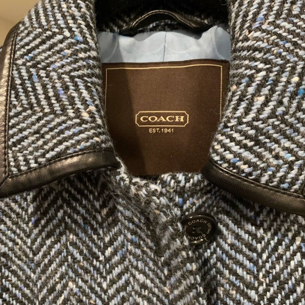 Like new, fashionable blue Coach coat.